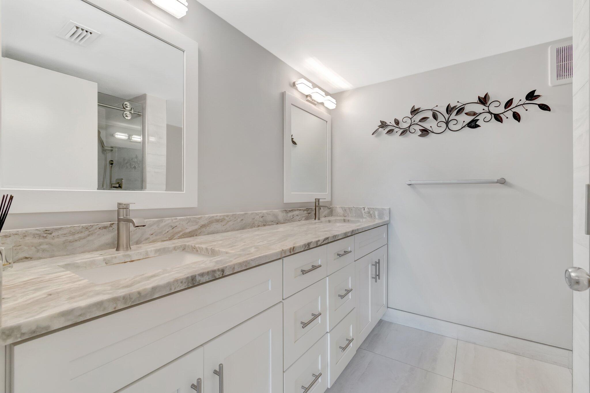 6149 Pointe Regal Circle, Unit 309 Delray Beach, FL 33484 - Photo 35 of 106 Primary Bathroom