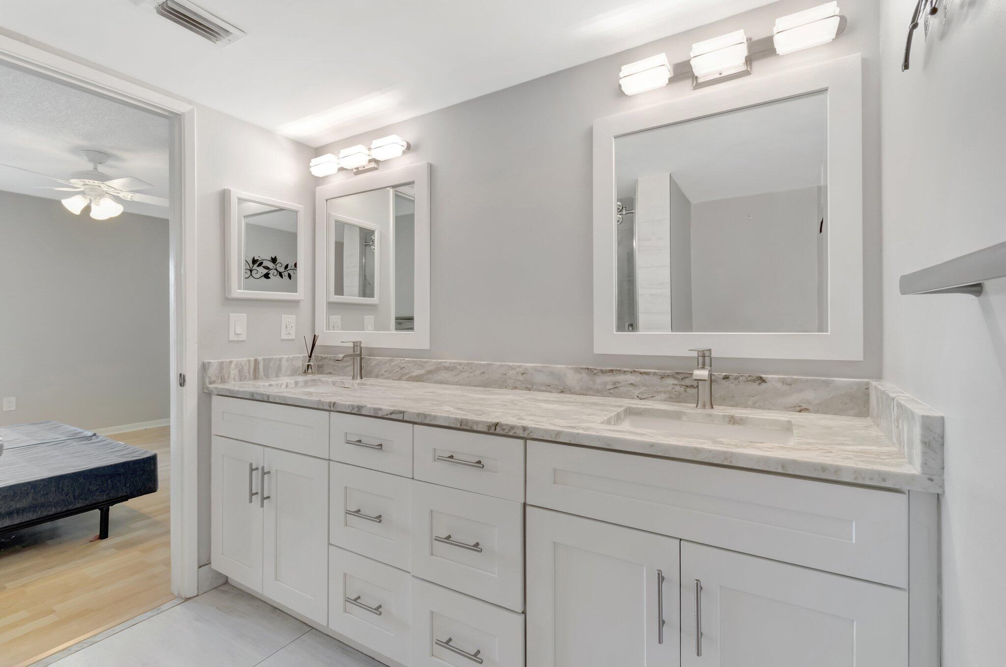 6149 Pointe Regal Circle, Unit 309 Delray Beach, FL 33484 - Photo 36 of 106 Primary Bathroom
