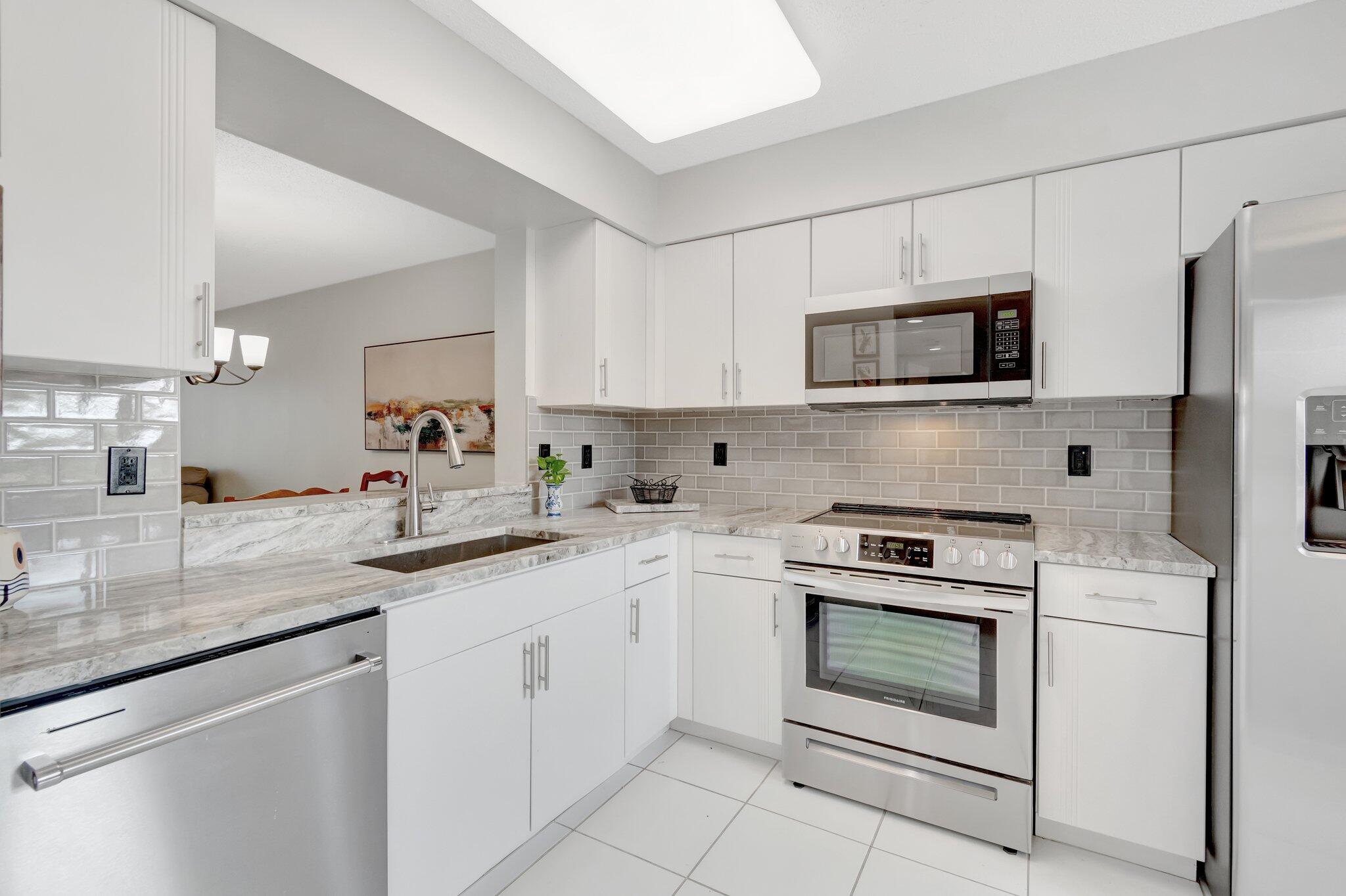 6149 Pointe Regal Circle, Unit 309 Delray Beach, FL 33484 - Photo 7 of 106 Kitchen