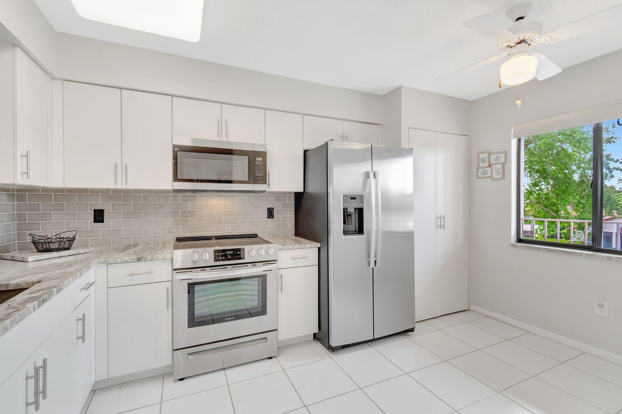 6149 Pointe Regal Circle, Unit 309 Delray Beach, FL 33484 - Photo 8 of 106 Kitchen