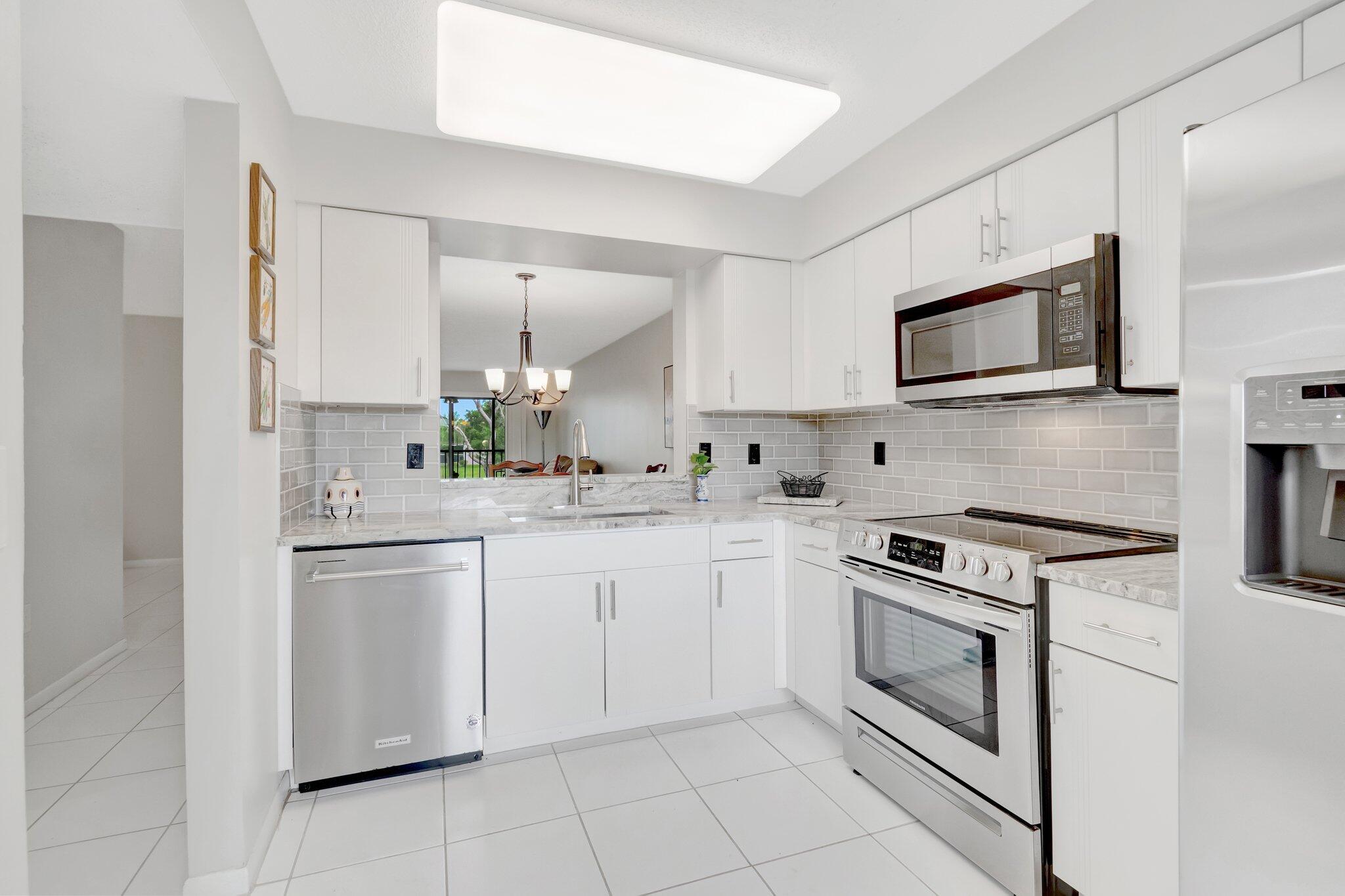 6149 Pointe Regal Circle, Unit 309 Delray Beach, FL 33484 - Photo 10 of 106 Kitchen