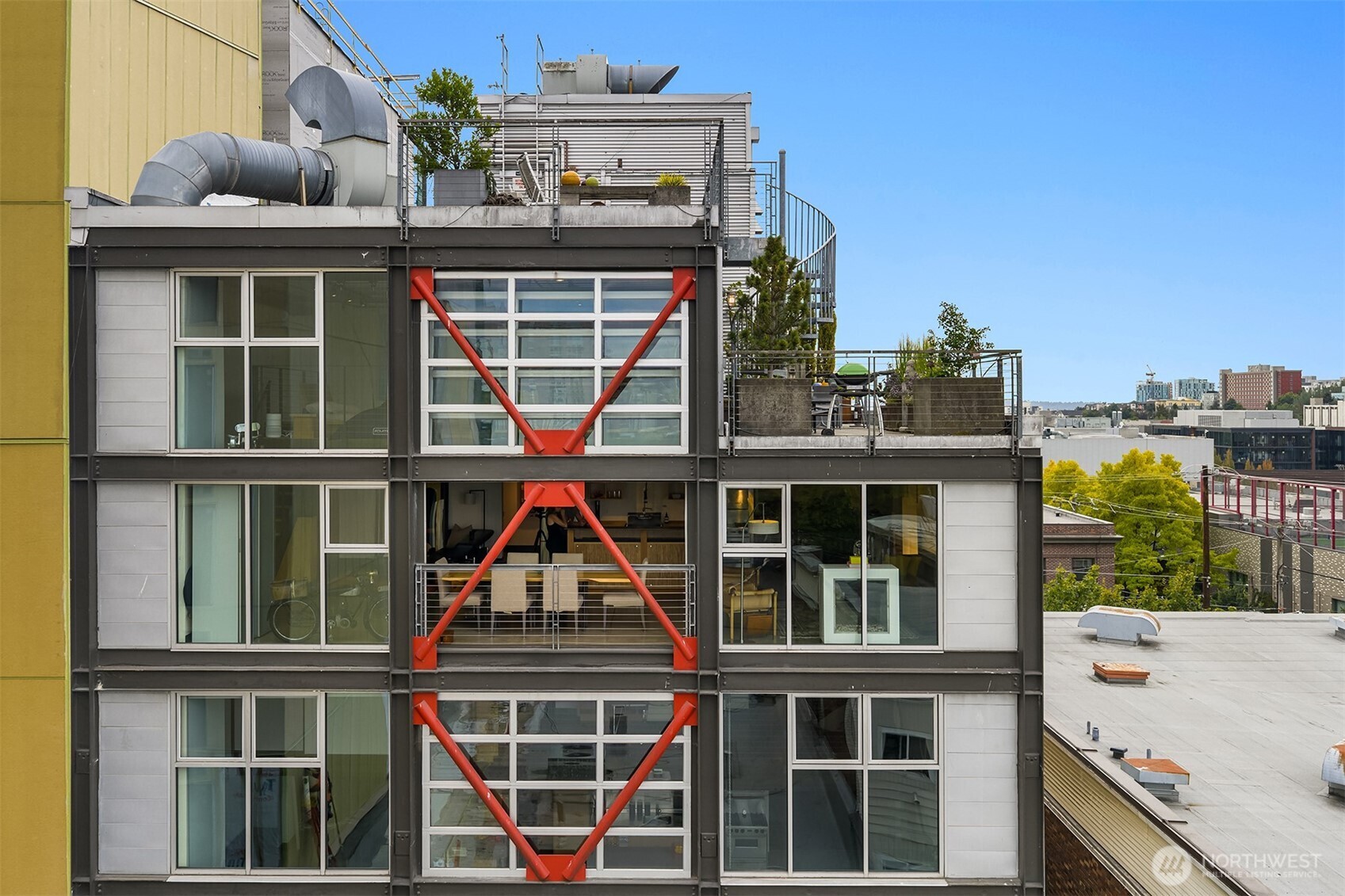 1310 East Union Street, Unit 501 Seattle, WA 98122 - Photo 2 of 30 a front view of a house with a yard