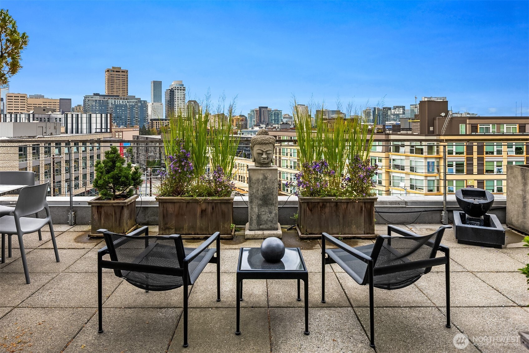1310 East Union Street, Unit 501 Seattle, WA 98122 - Photo 25 of 30 a view of a chairs and table in a terrace