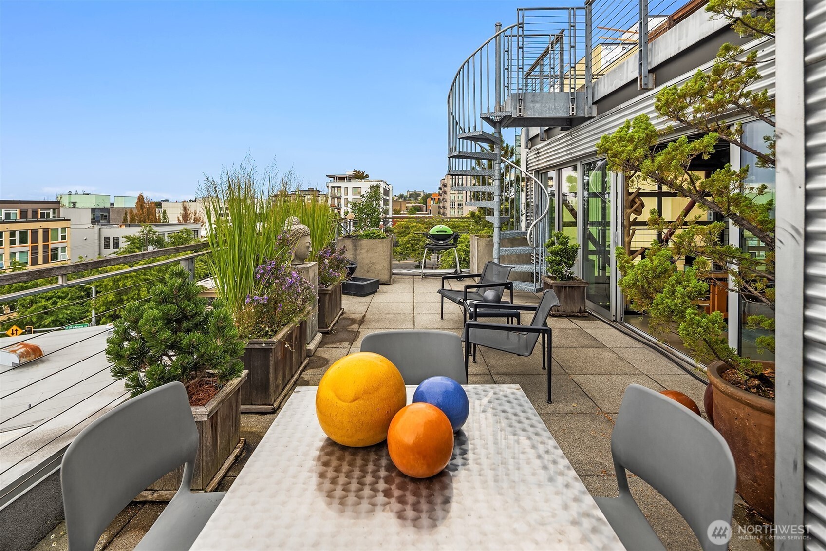 1310 East Union Street, Unit 501 Seattle, WA 98122 - Photo 26 of 30 a view of a swimming pool with outdoor seating