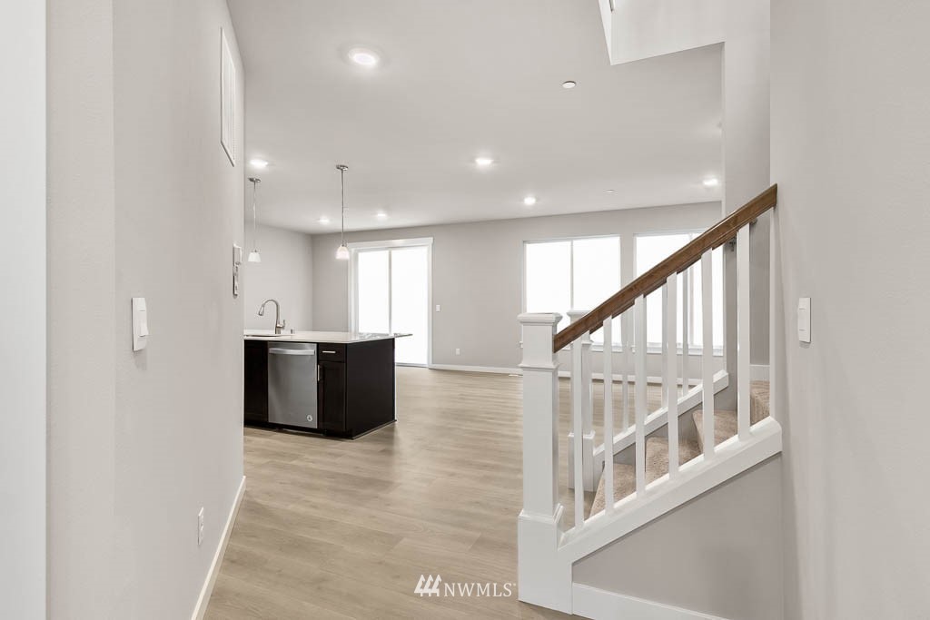 31 211th Street Southeast, Unit P15 Bothell, WA 98021 - Photo 12 of 40 a view of an entryway with wooden floor