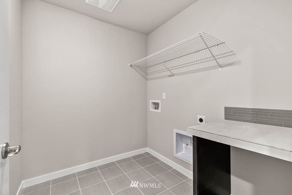 31 211th Street Southeast, Unit P15 Bothell, WA 98021 - Photo 16 of 40 a view of an empty walk in closet