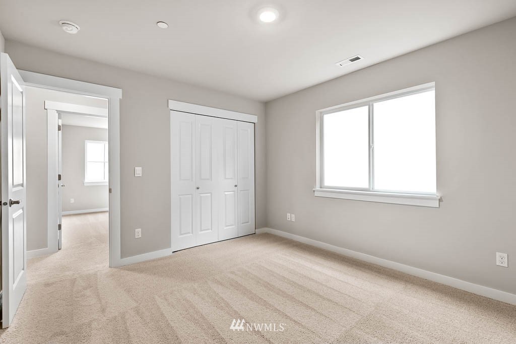 31 211th Street Southeast, Unit P15 Bothell, WA 98021 - Photo 18 of 40 a view of an empty room with a window