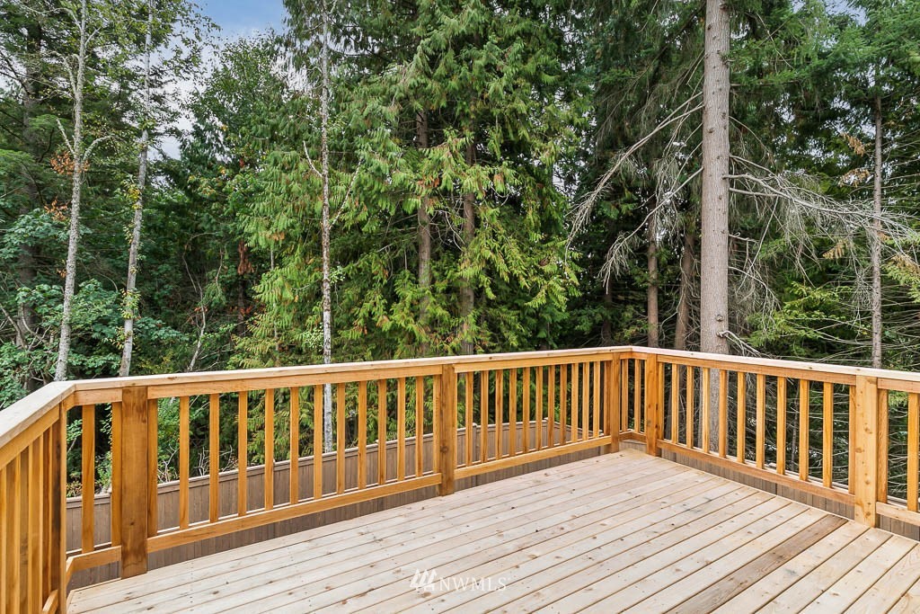 31 211th Street Southeast, Unit P15 Bothell, WA 98021 - Photo 35 of 40 a view of wooden deck and a yard