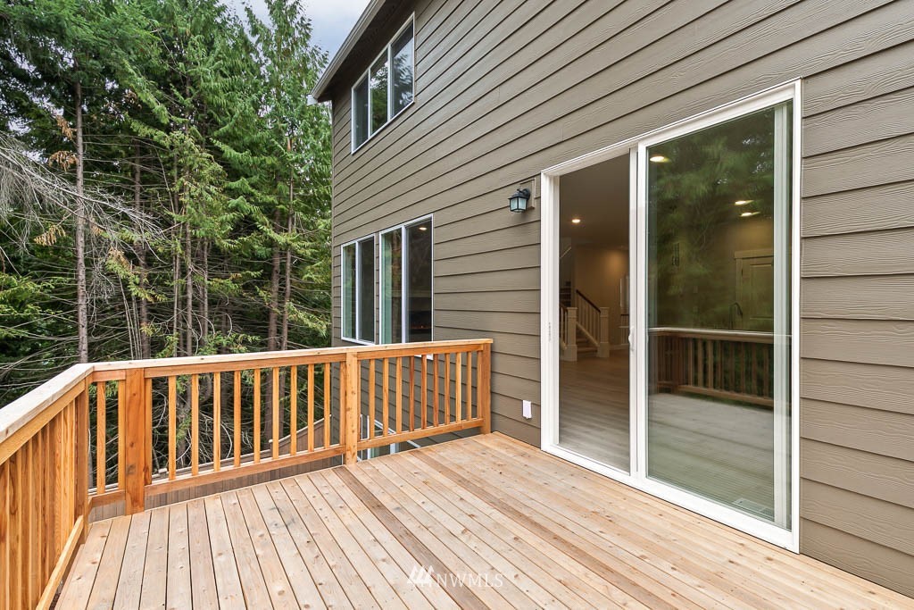 31 211th Street Southeast, Unit P15 Bothell, WA 98021 - Photo 36 of 40 a view of deck with a flat screen tv