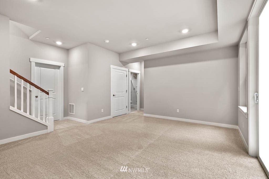 31 211th Street Southeast, Unit P15 Bothell, WA 98021 - Photo 38 of 40 a view of an empty room with wooden floor