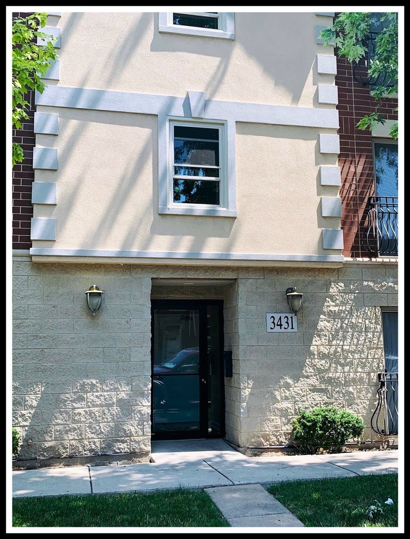 3431 Ridgeland Avenue, Unit 203 Berwyn, IL 60402 - Photo 18 of 18 a front view of a house with garden