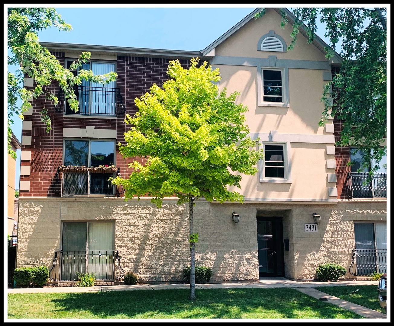 3431 Ridgeland Avenue, Unit 203 Berwyn, IL 60402 - Photo 2 of 18 a front view of a house with garden