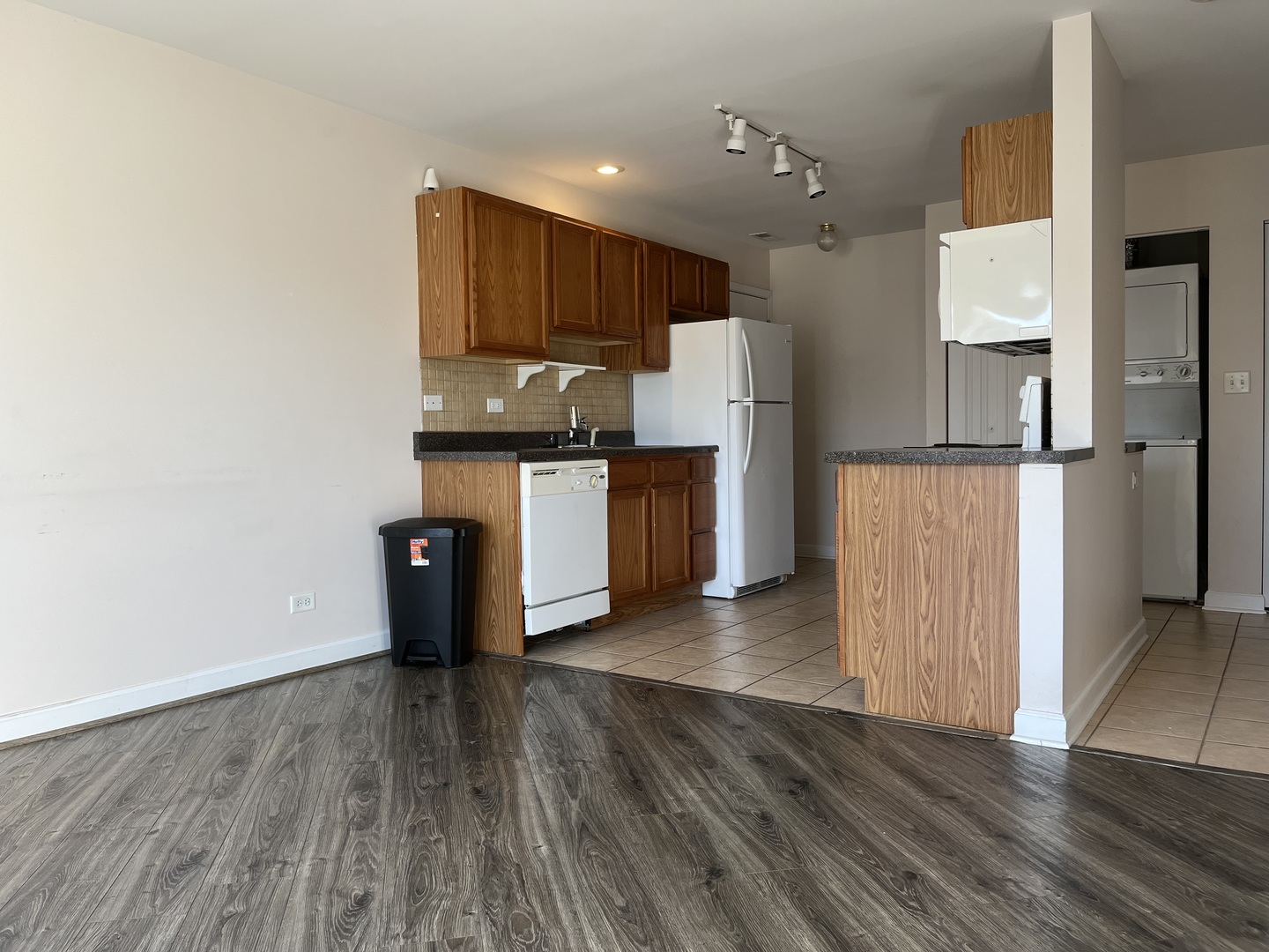 3431 Ridgeland Avenue, Unit 203 Berwyn, IL 60402 - Photo 5 of 18 a kitchen with stainless steel appliances a refrigerator and a stove top oven