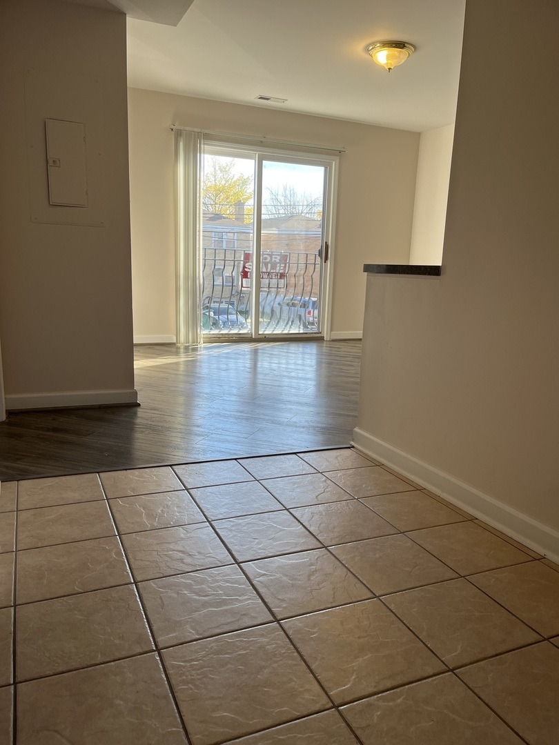3431 Ridgeland Avenue, Unit 203 Berwyn, IL 60402 - Photo 7 of 18 a view of a livingroom with wooden floor