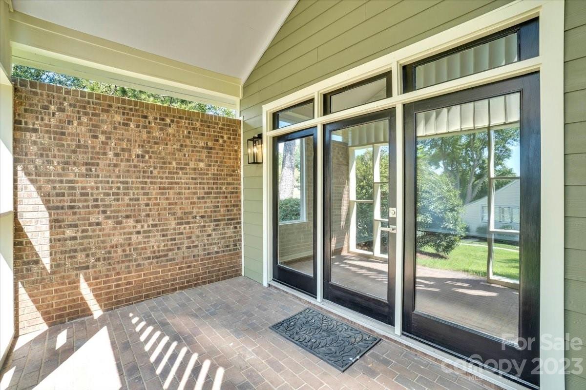 8301 Raintree Lane Charlotte, NC 28277 - Photo 19 of 42 a bathroom with a glass door shower