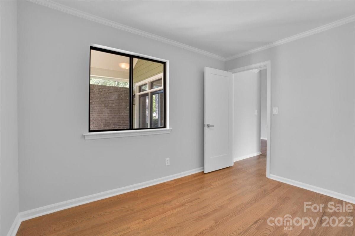 8301 Raintree Lane Charlotte, NC 28277 - Photo 20 of 42 a view of an empty room with a window