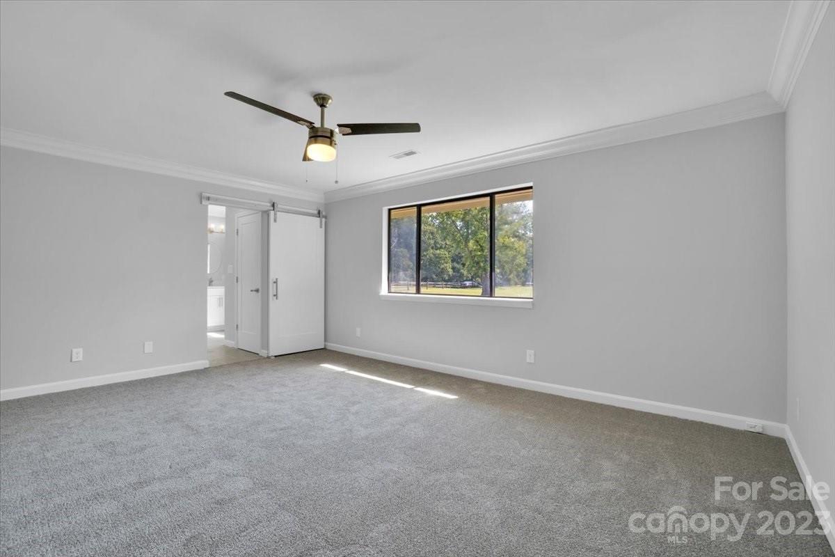 8301 Raintree Lane Charlotte, NC 28277 - Photo 24 of 42 a view of an empty room with a window