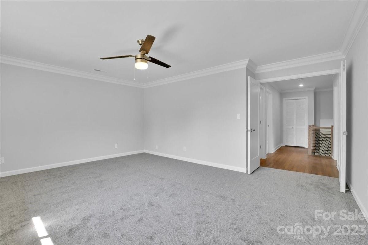 8301 Raintree Lane Charlotte, NC 28277 - Photo 25 of 42 a view of empty room with wooden floor