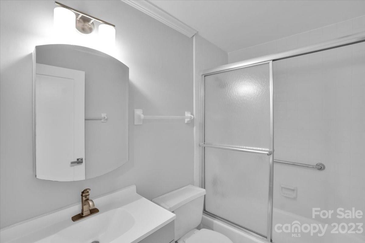 8301 Raintree Lane Charlotte, NC 28277 - Photo 34 of 42 a bathroom with a sink and mirror
