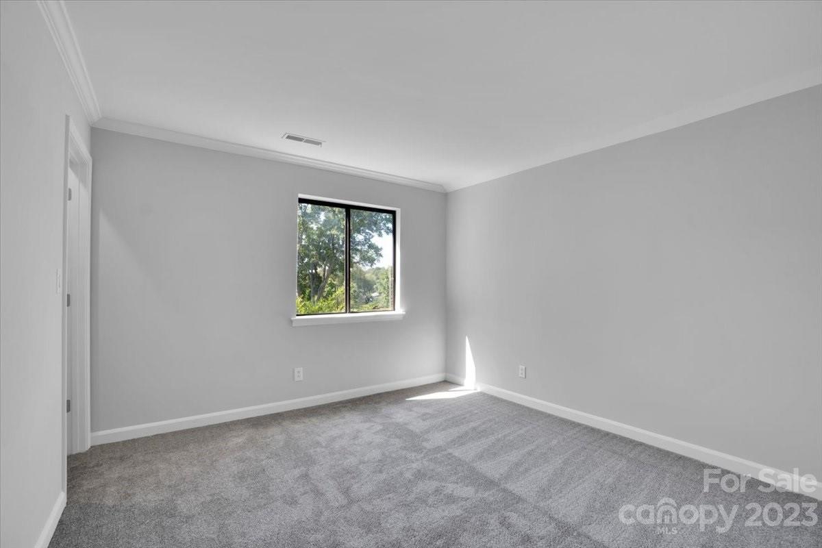 8301 Raintree Lane Charlotte, NC 28277 - Photo 35 of 42 an empty room with windows
