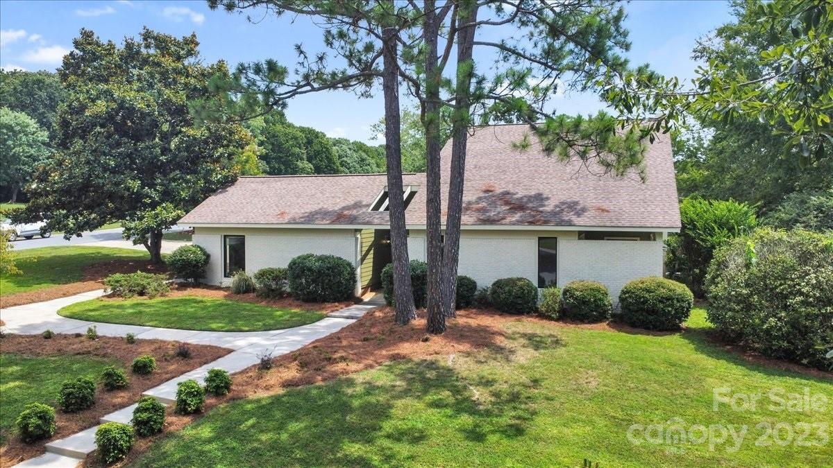 8301 Raintree Lane Charlotte, NC 28277 - Photo 42 of 42 front view of a house with a yard