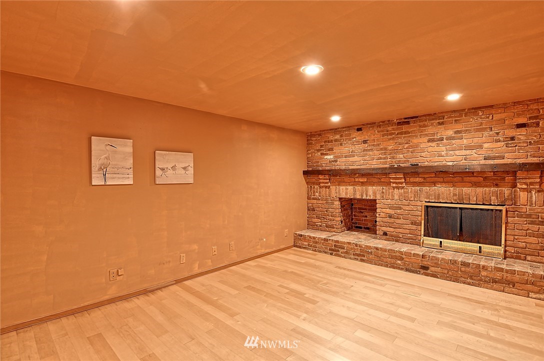 5011 228th Street Southeast Bothell, WA 98021 - Photo 28 of 40 a view of an empty room with a fireplace
