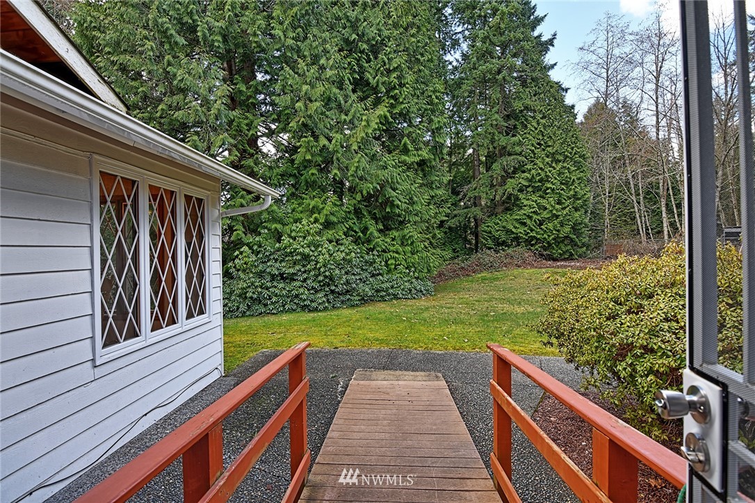 5011 228th Street Southeast Bothell, WA 98021 - Photo 34 of 40 a view of a backyard with sitting area