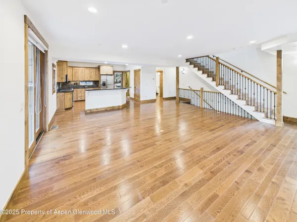 a view of a living room with a large window