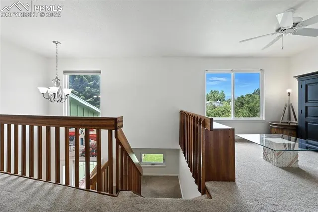 a view of a living room and dining room
