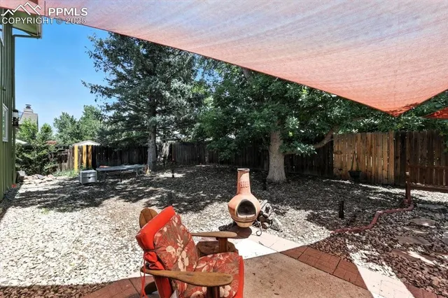 a backyard of a house with seating space