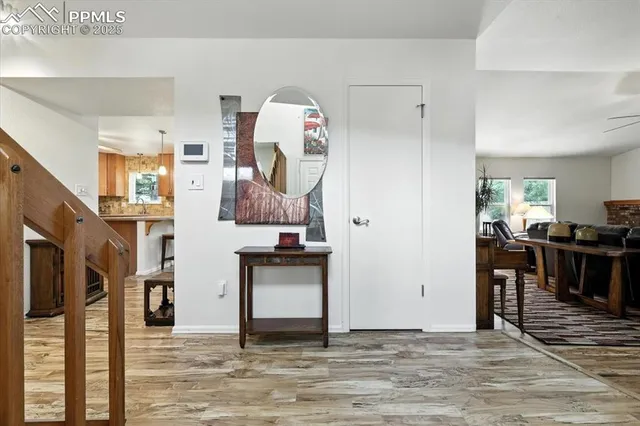 a view of living room and kitchen
