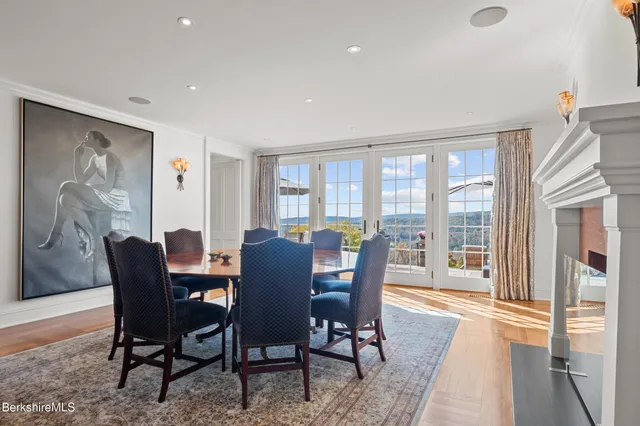 a view of a balcony with wooden floor