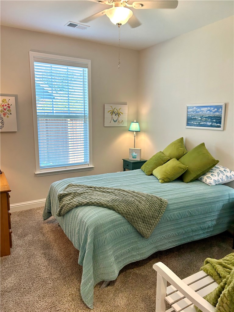170 Capslock Trail Pendleton, SC 29670 - Photo 15 of 22 High ceilings and plush carpeting enhance this serene bedroom space.