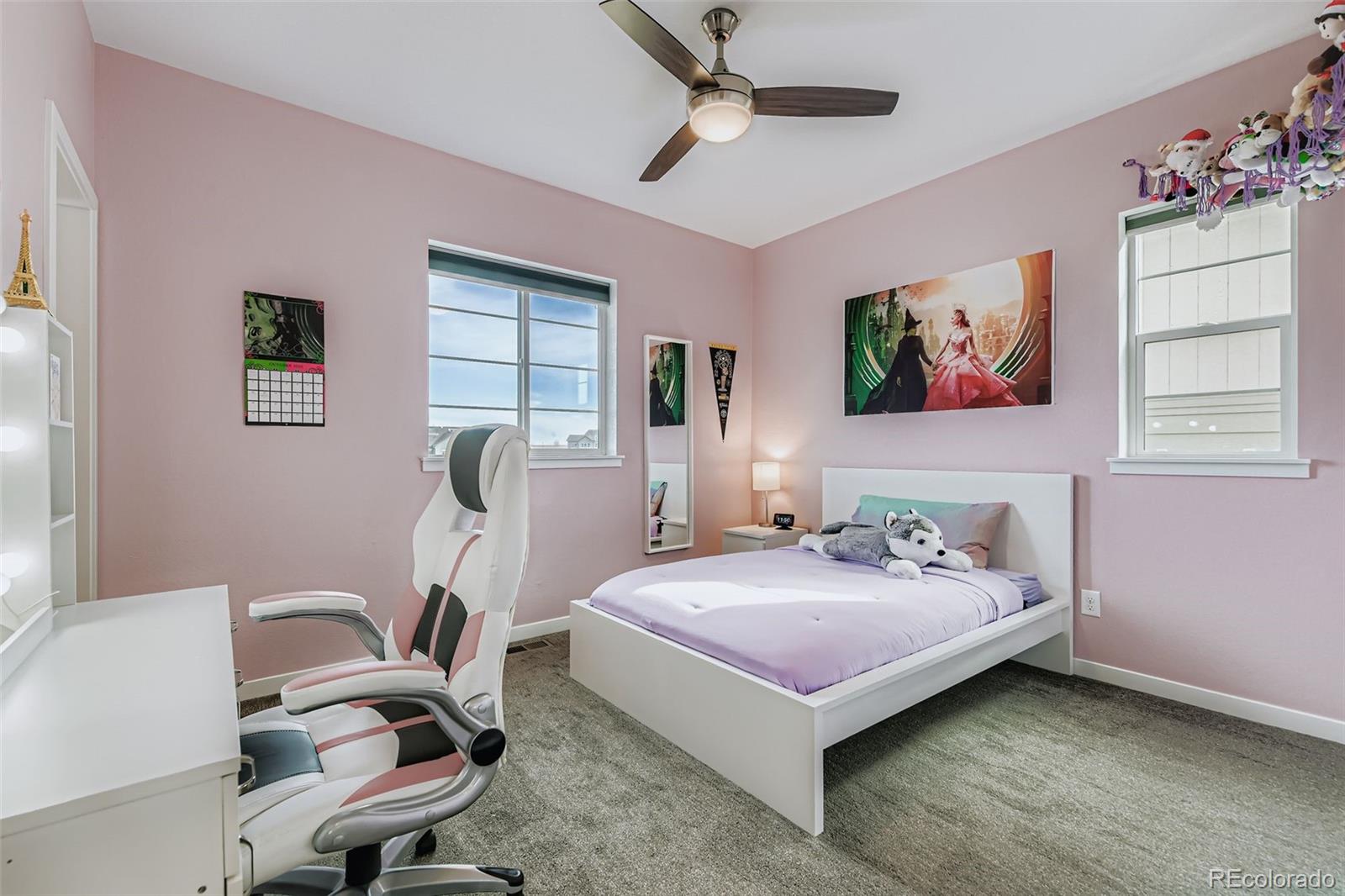 86 Nova Court Erie, CO 80516 - Photo 19 of 50 a bedroom with a bed and a desk