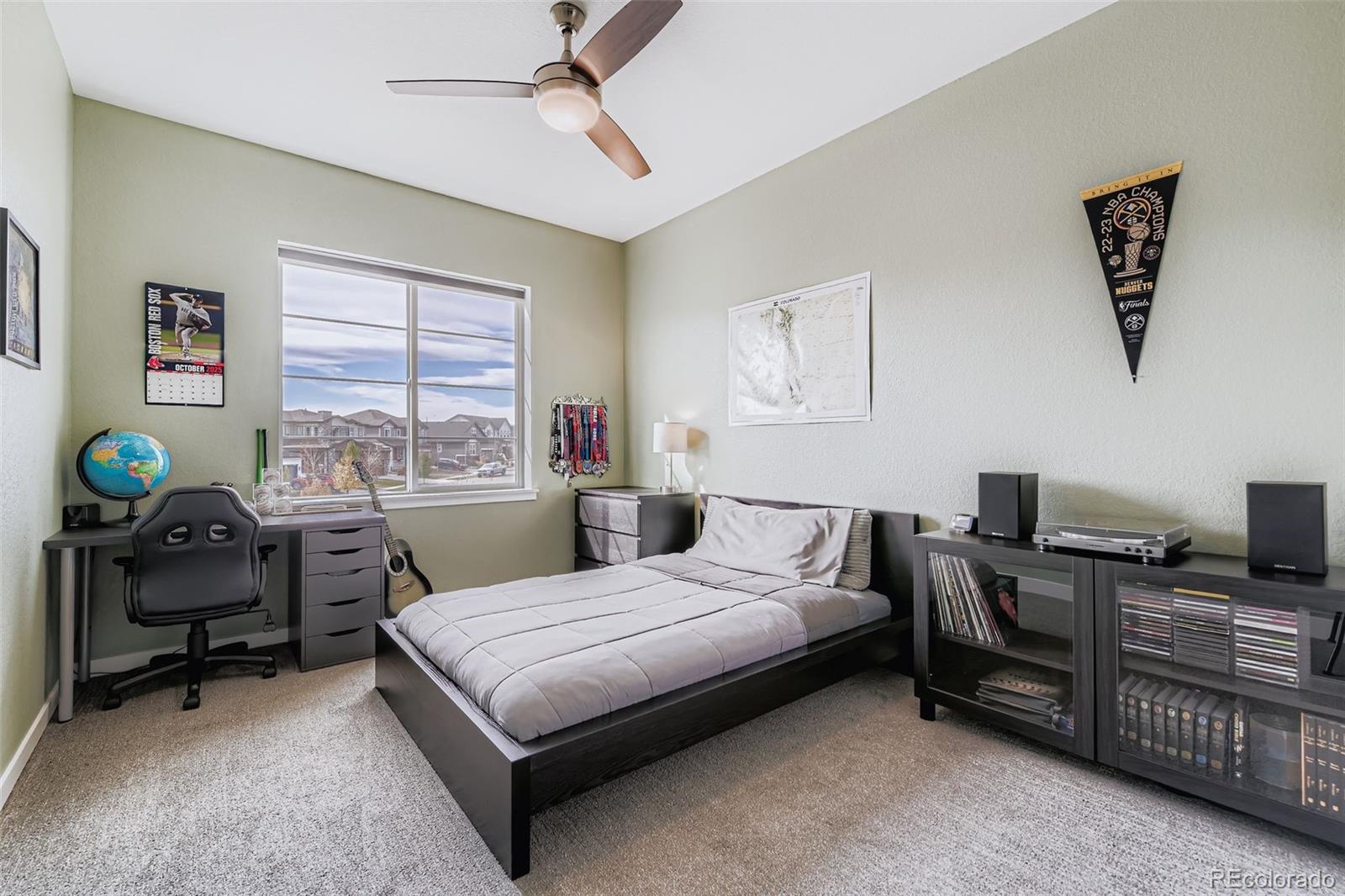 86 Nova Court Erie, CO 80516 - Photo 23 of 50 a bedroom with a bed and furniture
