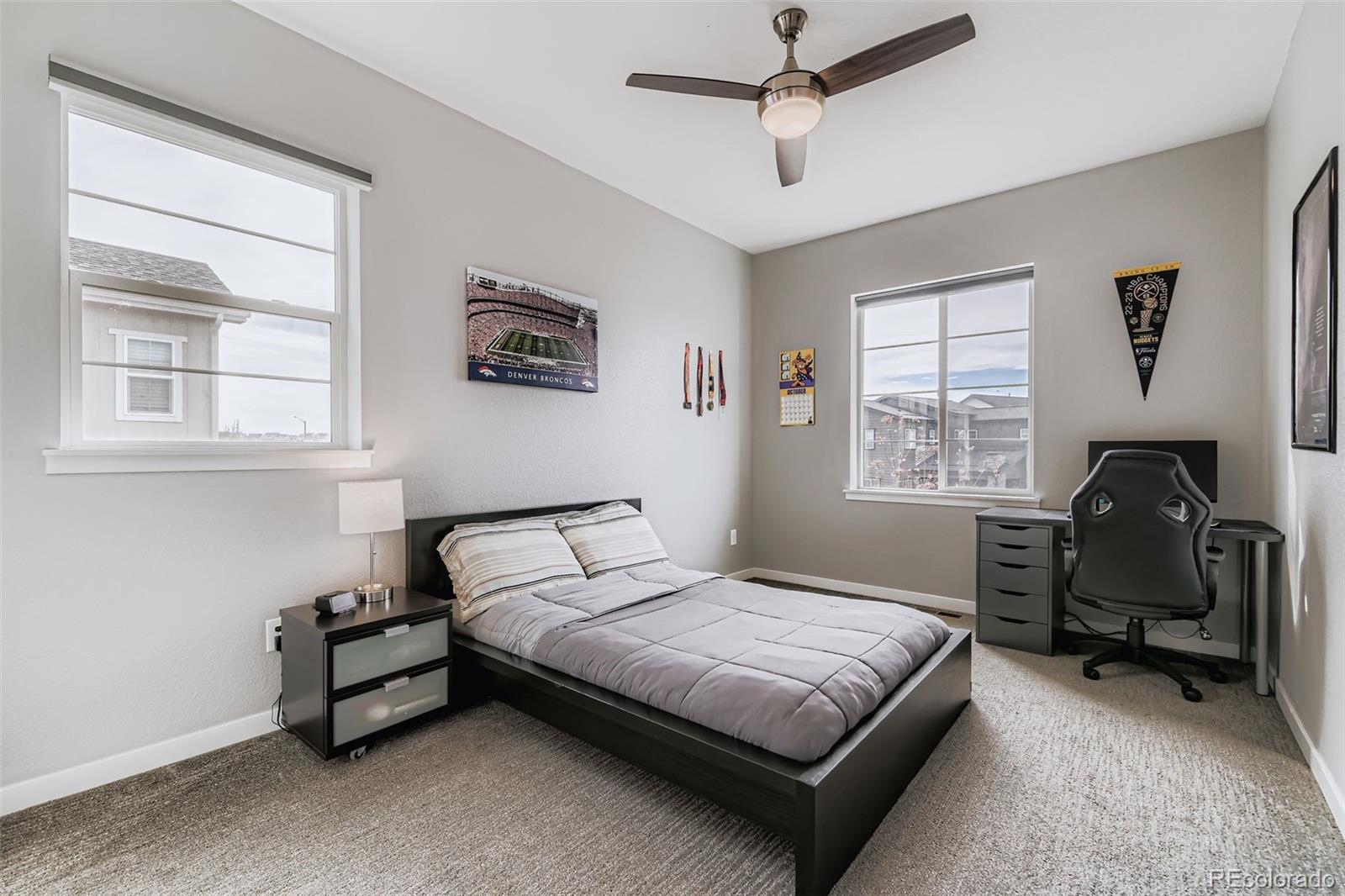 86 Nova Court Erie, CO 80516 - Photo 24 of 50 a bedroom with a bed and a window