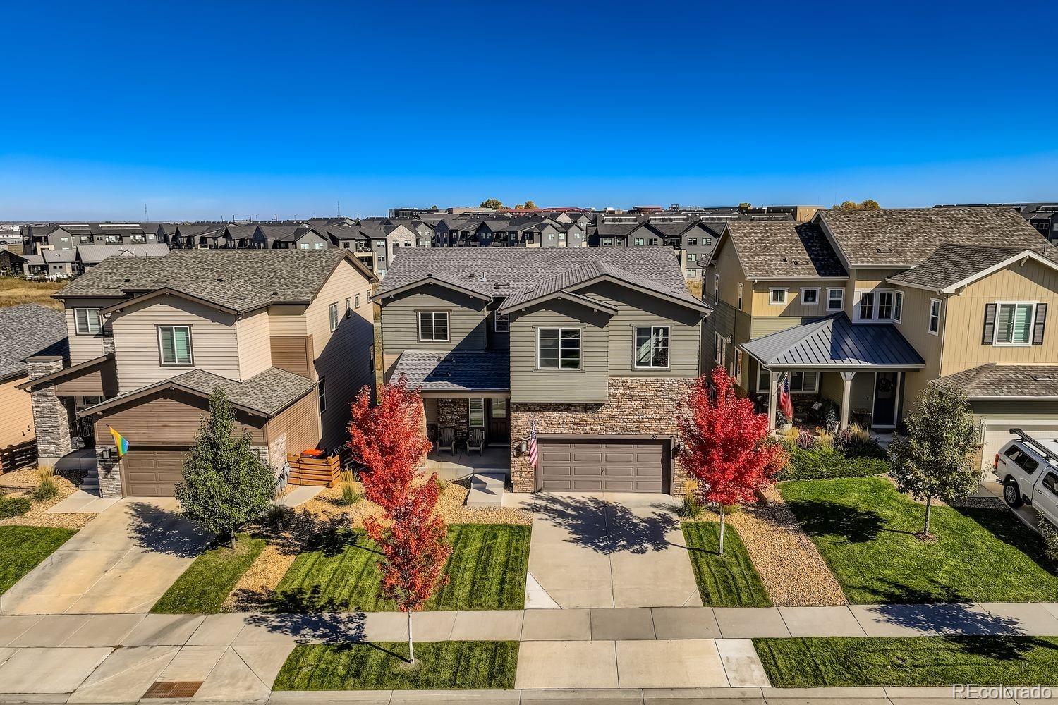 86 Nova Court Erie, CO 80516 - Photo 41 of 50 front view of a house with a yard