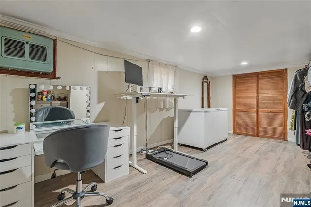 a workspace with furniture and window