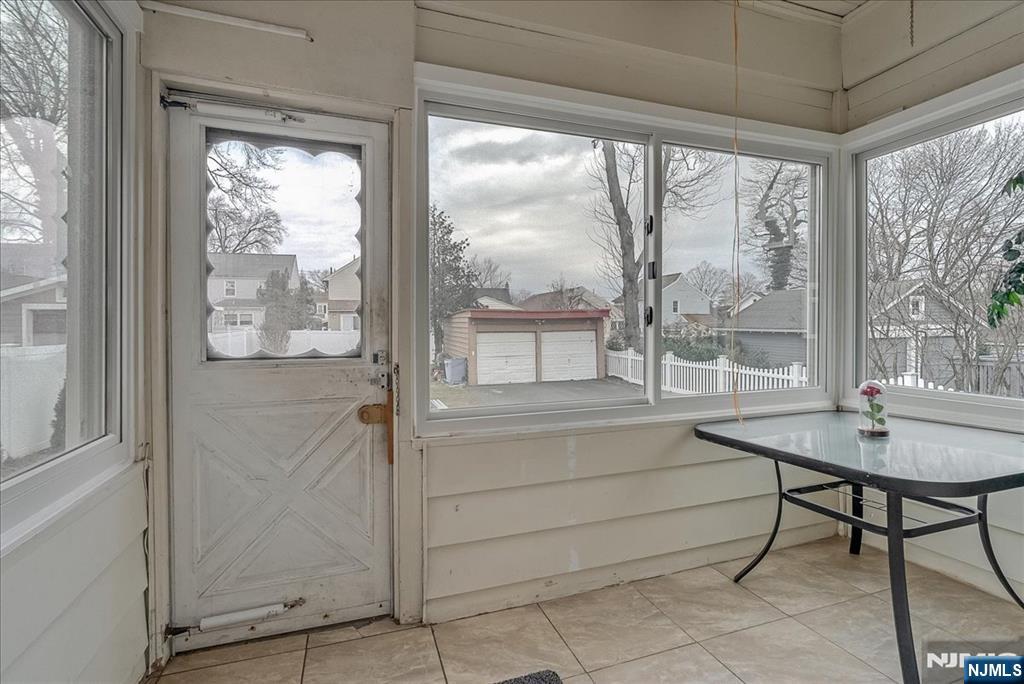 15 Belle Terre Road West Orange, NJ 07052 - Photo 21 of 29 a room that has a wooden floor and a table chair
