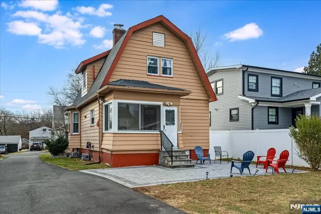 a front view of a house with patio