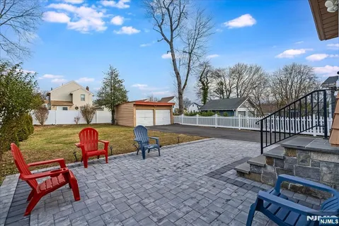 a park view with a bench and trees