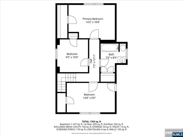 a picture of a bench in front of a wall