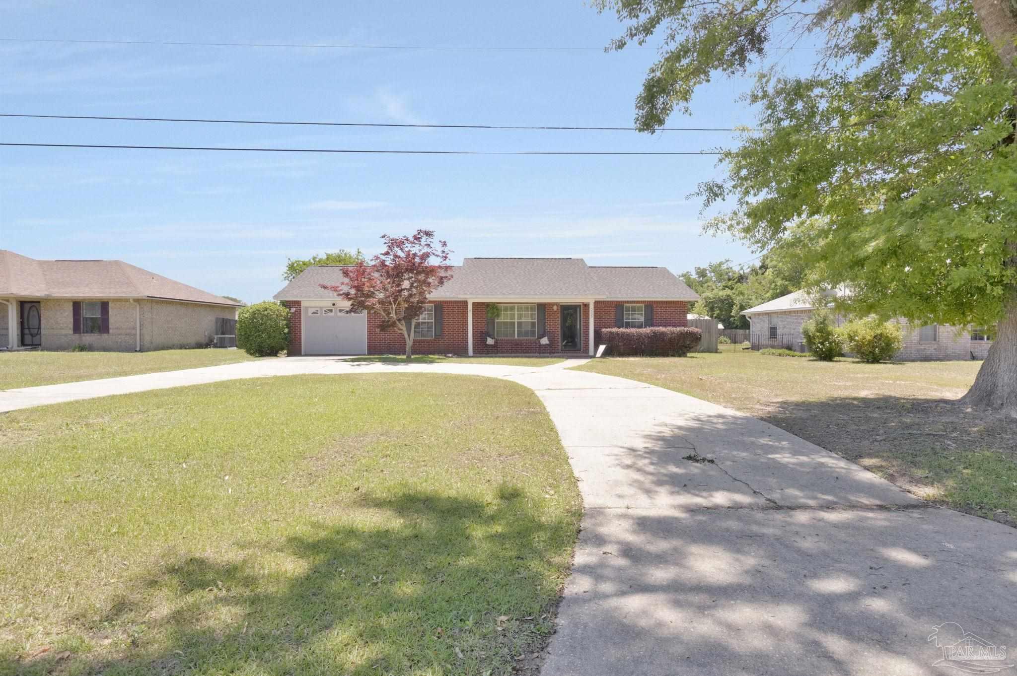 5539 Windrun Place Pace, FL 32571 - Photo 54 of 62 a house view with swimming pool in front of it