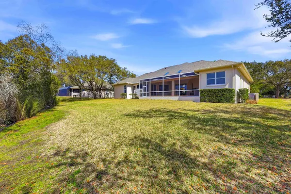 a view of outdoor space with deck and yard