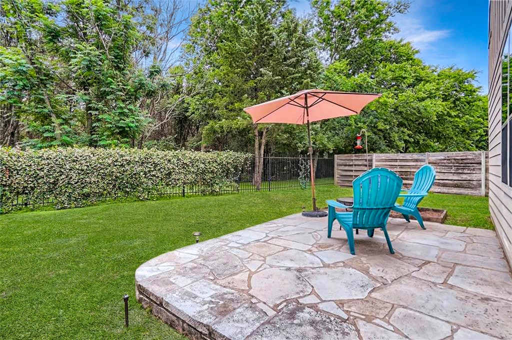 2101 Rivers Edge Way, Unit 19 Austin, TX 78741 - Photo 22 of 24 a view of backyard with seating space