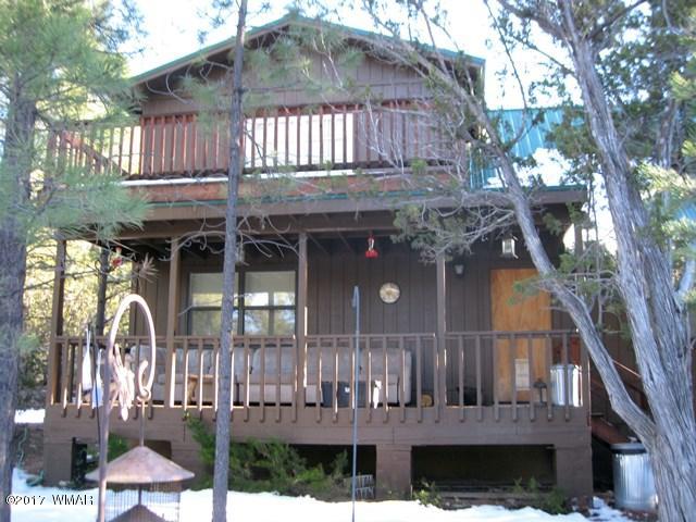2910 Red Cinder Road Heber, AZ 85928 - Photo 1 of 27 a view of house with a iron gate