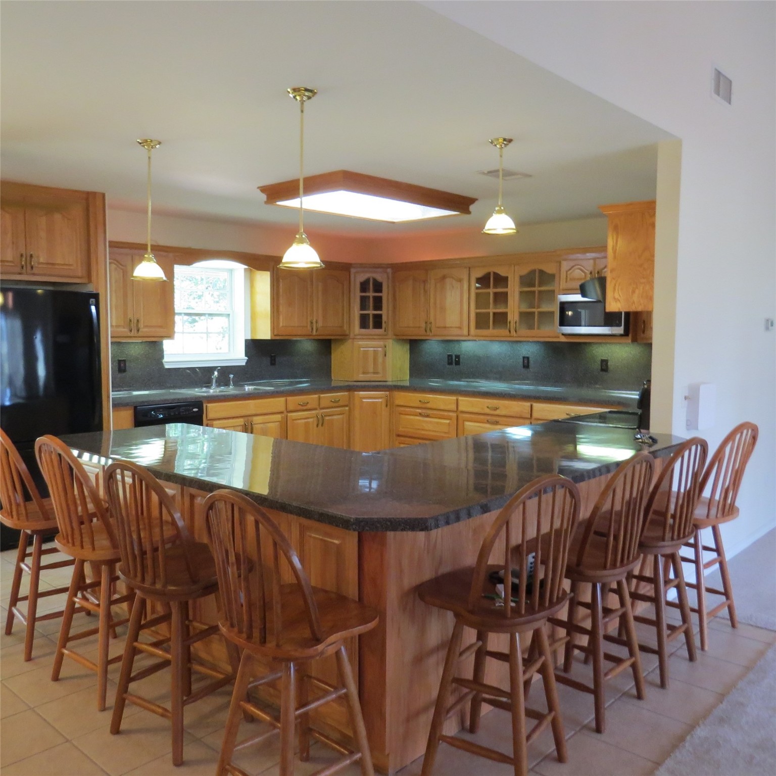 651 Sam Houston Loop Point Blank, TX 77364 - Photo 14 of 47 Kitchen eat-in bar seats eight!