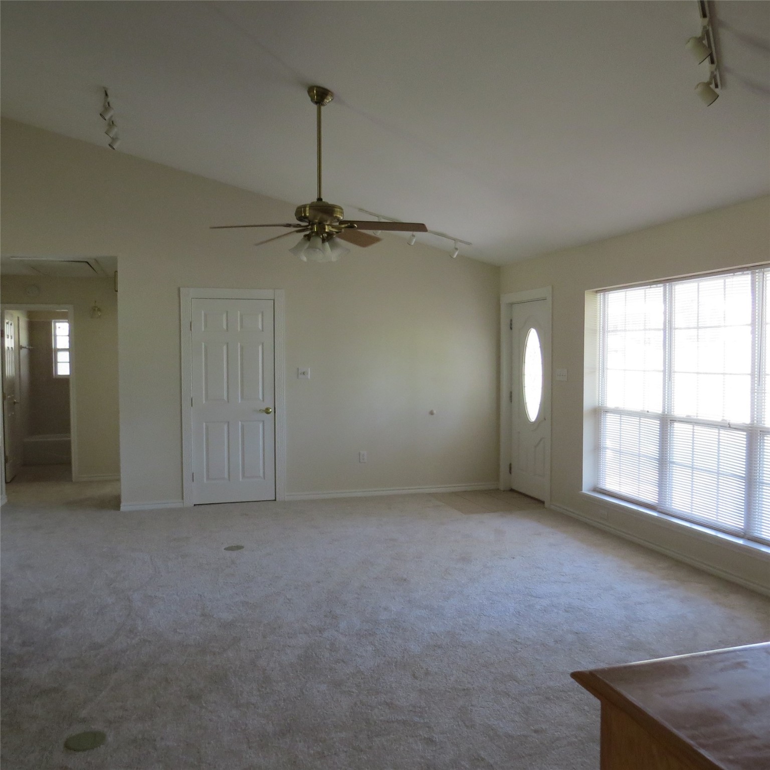 651 Sam Houston Loop Point Blank, TX 77364 - Photo 18 of 47 an empty room with a empty space and windows