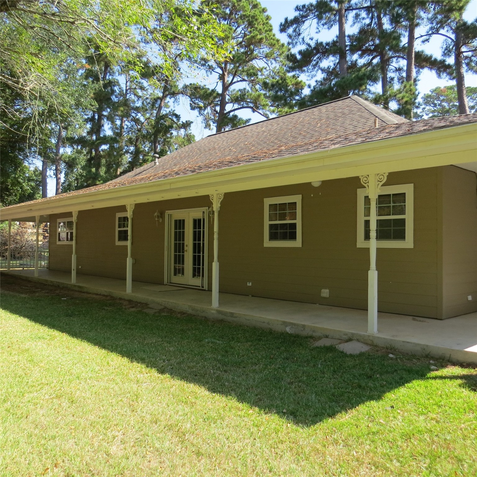651 Sam Houston Loop Point Blank, TX 77364 - Photo 2 of 47 a backyard of a house