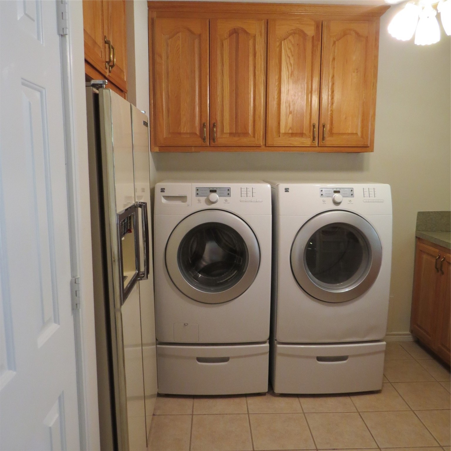 651 Sam Houston Loop Point Blank, TX 77364 - Photo 23 of 47 a utility room with dryer and washer